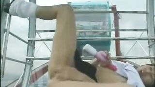 Japanese Girl Masturbates on a Ferris Wheel